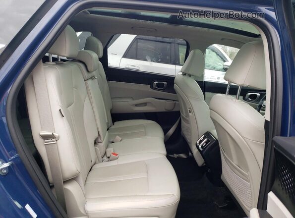 5XYRL4JC8RG300519 2024 KIA SORENTO Blue Սալոնի հետևի տեսք