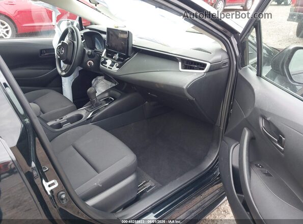 5YFB4MDE4PP008676 2023 TOYOTA COROLLA Черный Вид салона спереди