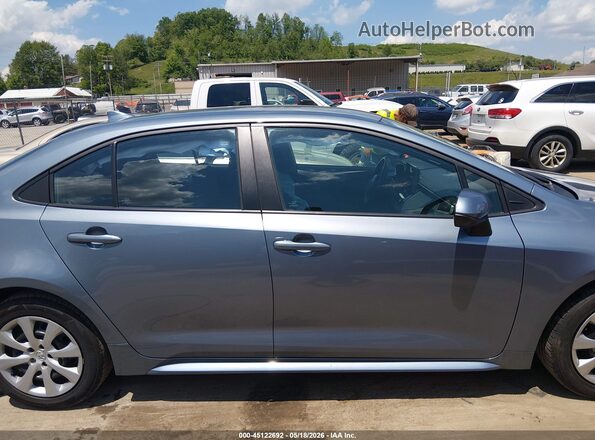 5YFB4MDEXPP060829 2023 TOYOTA COROLLA Light Blue Вид задней части салона