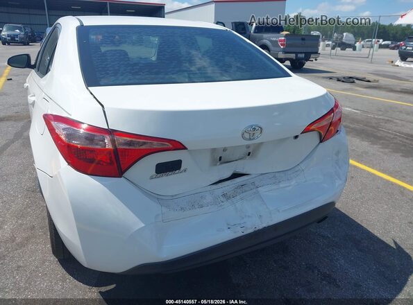 5YFBURHE2KP906144 2019 TOYOTA COROLLA Белый Вид спереди