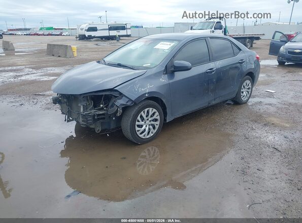 5YFBURHE2KP936261 2019 TOYOTA LL Gray Front left