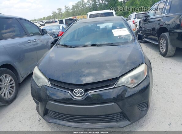 5YFBURHE4GP379571 2016 TOYOTA COROLLA Черный Вид задней части салона