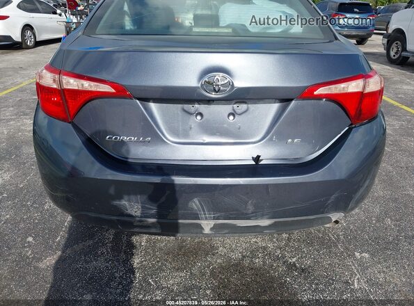 5YFBURHE4HP723899 2017 TOYOTA COROLLA Gray 