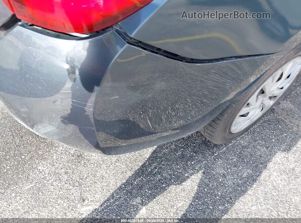 5YFBURHE4HP723899 2017 TOYOTA COROLLA Gray 