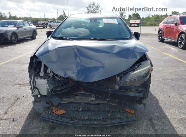 5YFBURHE4HP723899 2017 TOYOTA COROLLA Gray 