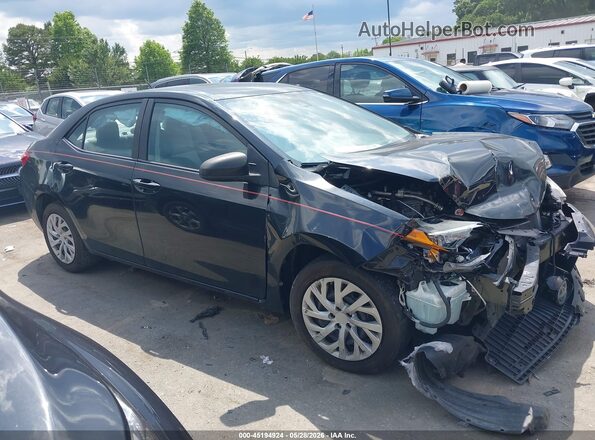 5YFBURHE4KP865242 2019 TOYOTA COROLLA Черный Вид задней части салона