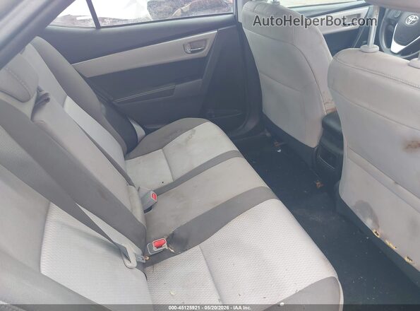 5YFBURHE4KP868710 2019 TOYOTA COROLLA Silver VIN sticker view