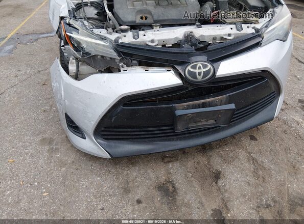 5YFBURHE4KP868710 2019 TOYOTA COROLLA Silver Front view