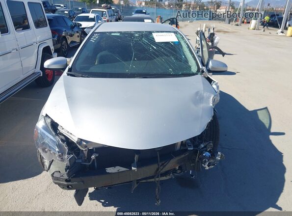 5YFBURHE4KP891856 2019 TOYOTA LL Silver Սալոնի հետևի տեսք