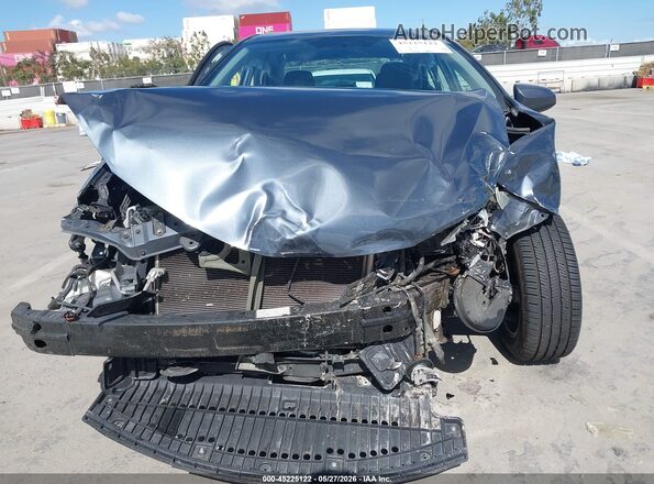 5YFBURHE5GP403134 2016 TOYOTA COROLLA Gray Rear interior view