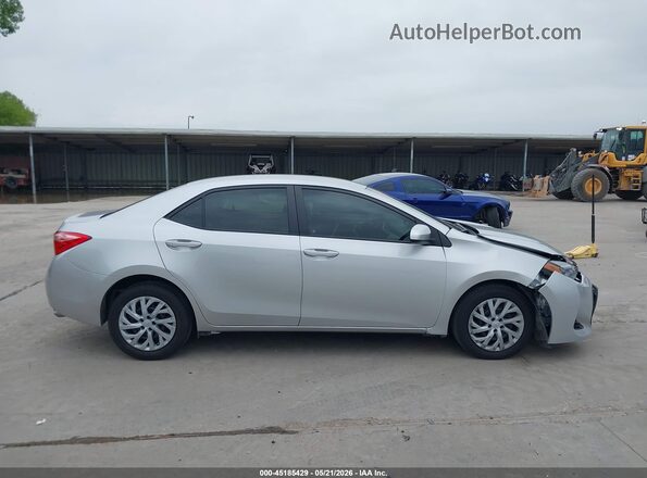 5YFBURHE5HP696874 2017 TOYOTA COROLLA Silver Rear interior view