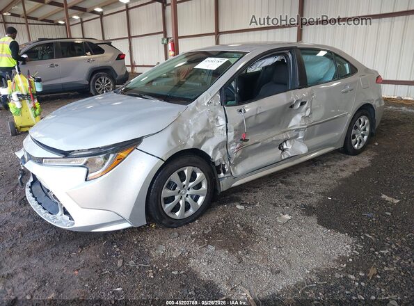 5YFEPMAE2MP212865 2021 TOYOTA COROLLA Silver წინა მარცხენა ხედი სამი მეოთხედიდან