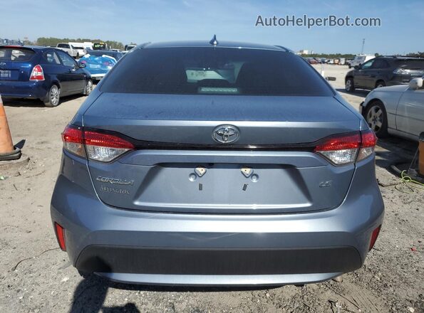 5YFEPMAE5NP302884 2022 TOYOTA COROLLA Blue Vista trasera
