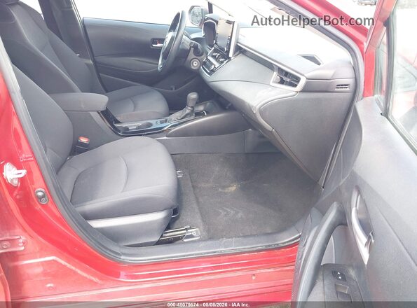 5YFEPMAE9MP234099 2021 TOYOTA LL Maroon წინა სალონის ხედი