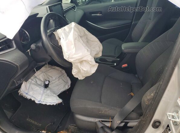 5YFS4MCE2MP090033 2021 TOYOTA COROLLA Silver Front interior view