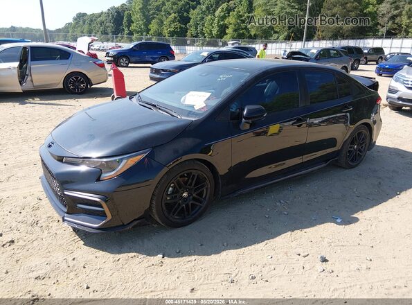 5YFS4MCE4MP073492 2021 TOYOTA COROLLA Black Vista tres cuartos delantera izquierda