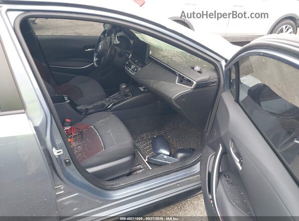 5YFS4MCE5PP141903 2023 TOYOTA COROLLA Gray Front interior view