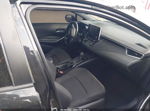 5YFS4MCE6MP086048 2021 TOYOTA LL Black Front interior view