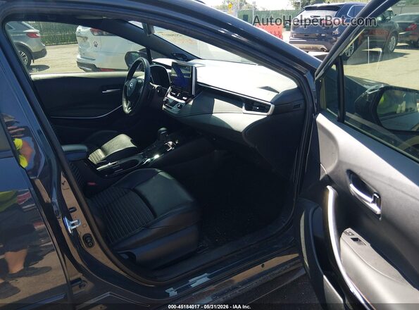 5YFT4MCE8PP159607 2023 TOYOTA COROLLA Серый Вид салона спереди