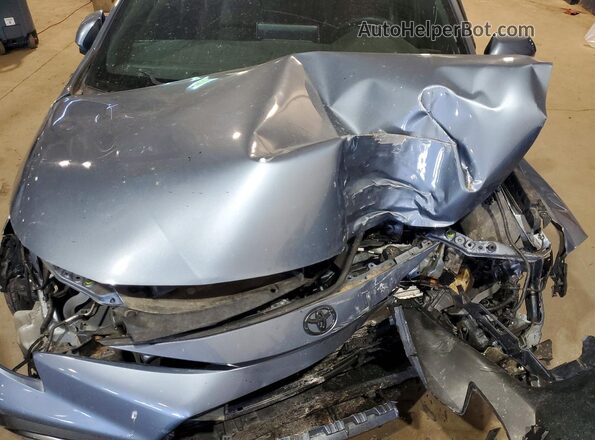 5YFT4RCE8LP030046 2020 TOYOTA COROLLA Silver Սալոնի հետևի տեսք