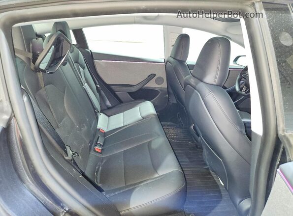 5YJ3E1EA8SF024962 2025 TESLA MODEL Charcoal Widok tylnych siedzeń