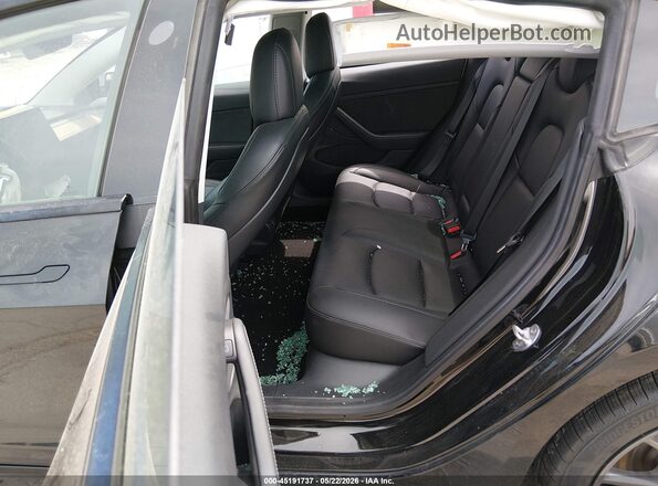 5YJ3E1EB0MF066778 2021 TESLA MODEL 3 Black VIN კოდის სტიკერის ხედი