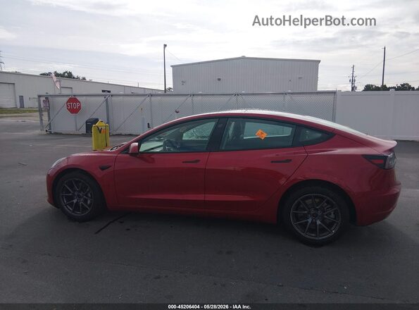 5YJ3E1EB2NF288319 2022 TESLA MODEL 3 Красный Вид задней части салона