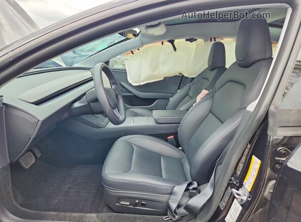 5YJ3E1EB8SF048705 2025 TESLA MODEL Черный Вид салона спереди