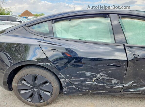 5YJ3E1EB8SF048705 2025 TESLA MODEL Черный Вид задних сидений
