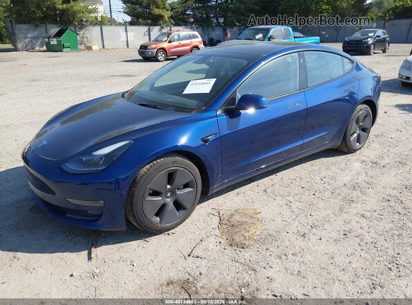 5YJ3E1EBXNF106074 2022 TESLA MODEL 3 Dark Blue Vista tres cuartos delantera izquierda
