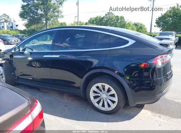 5YJXCBE20HF069960 2017 TESLA MODEL X Black Rear interior view