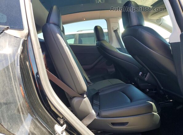 5YJYGAEE3MF214691 2021 TESLA MODEL Black Vista interior trasera