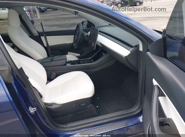 5YJYGDEE2MF061173 2021 TESLA MODEL Y Blue Вид салону спереду