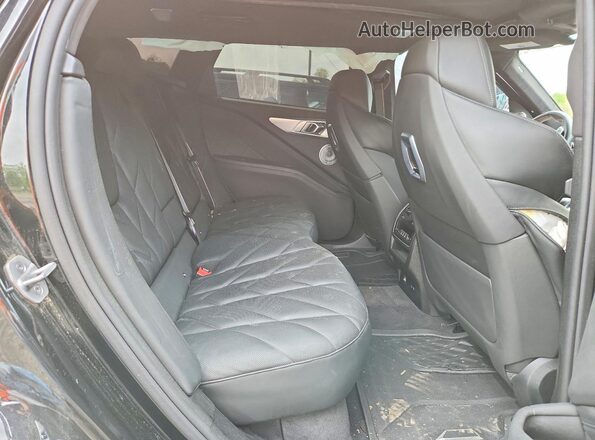 5YM23CS03S9Z60059 2025 BMW XM Черный Вид задней части салона
