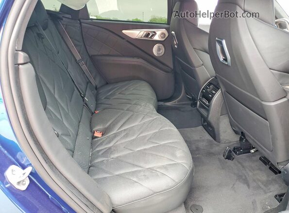 5YM23CS0XS9Z18374 2025 BMW XM Blue Rear interior view
