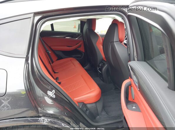 5YM23EC03N9K31784 2022 BMW X4 Black VIN sticker view