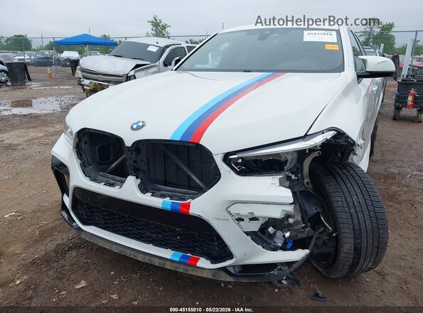 5YMCY0C01N9J04153 2022 BMW X6 M White Front view