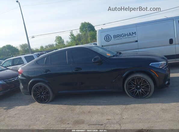 5YMCY0C04M9E65183 2021 BMW X6 M Black Widok wnętrza z tyłu