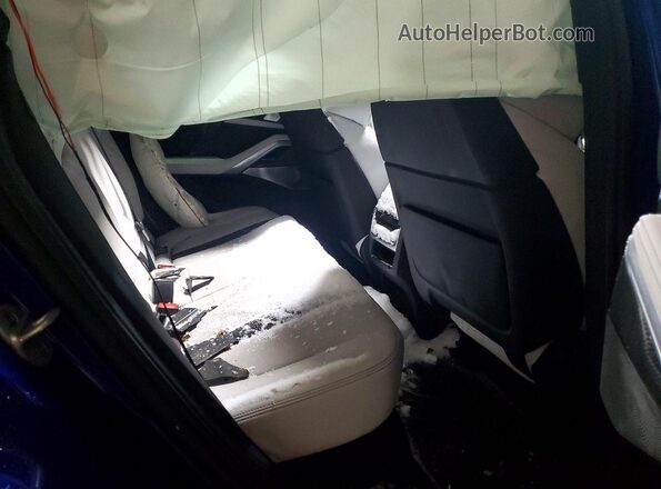 5YMCY0C06M9F10446 2021 BMW X6 Blue Vista de los asientos traseros
