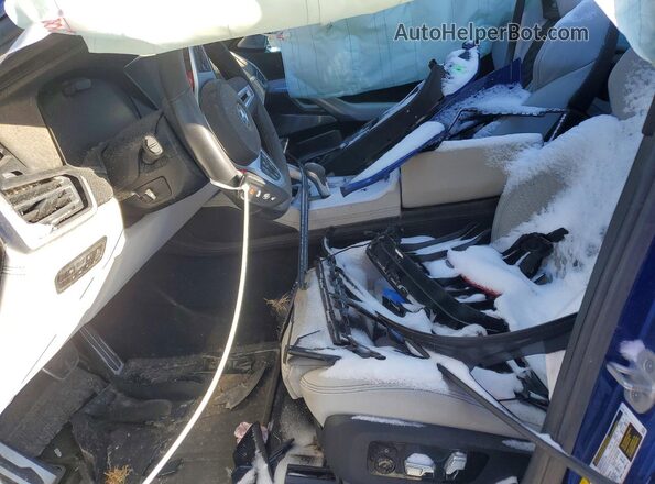 5YMCY0C06M9F10446 2021 BMW X6 Blue Vista interior delantera