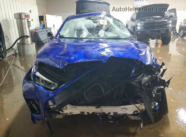5YMCY0C06M9F10446 2021 BMW X6 Blue Vista frontal