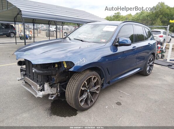 5YMTS0C03L9B70012 2020 BMW X3 Blue Առջևի ձախ երեք քառորդ տեսարան