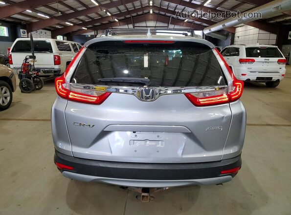 5J6RW2H50HL042304 2017 HONDA CR-V Silver Front interior view