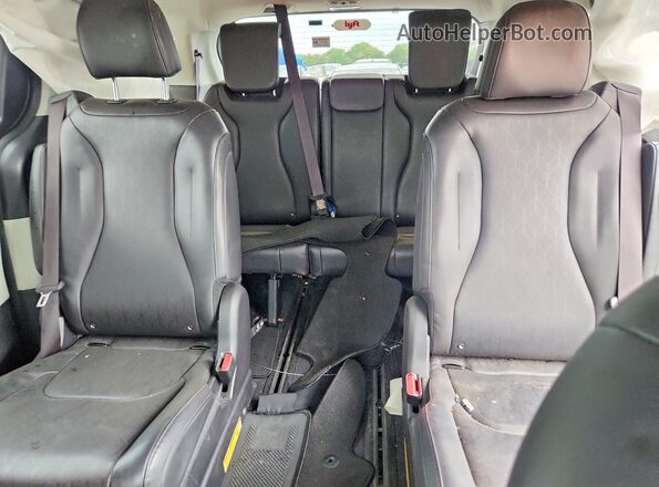 KNDNB4H34R6389418 2024 KIA CARNIVAL Red Vista interior trasera