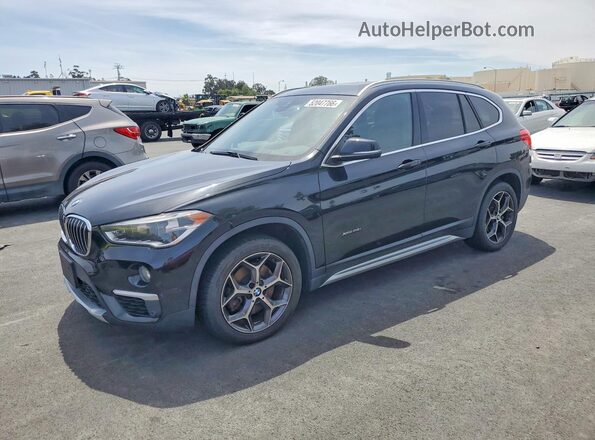 WBXHT3Z37H4A56438 2017 BMW X1 Black Trasero izquierdo