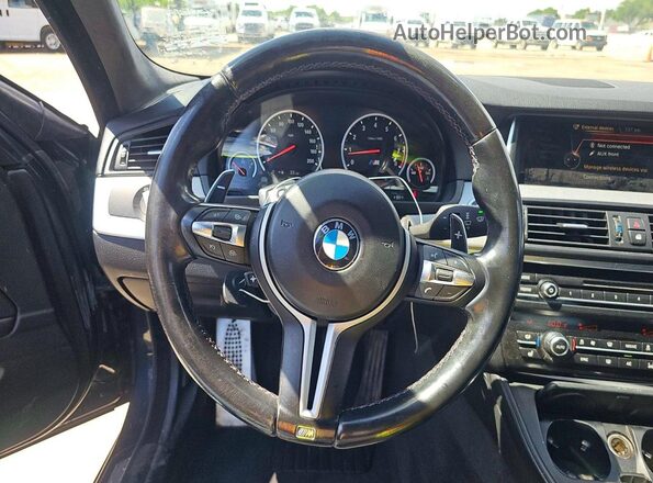 WBSFV9C55GD595740 2016 BMW M5 Gray Widok wnętrza z tyłu