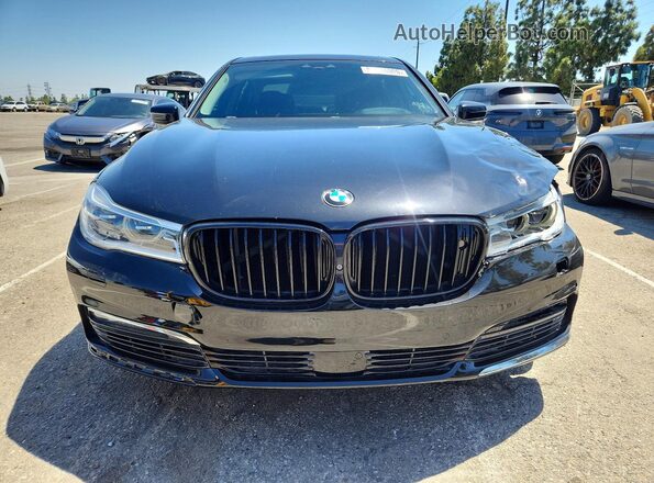 WBA7F0C59GGM20875 2016 BMW 7 SERIES Black Rear view