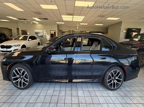 WBA33EJ02PCM30053 2023 BMW 7 SERIES Black Հետևի տեսք