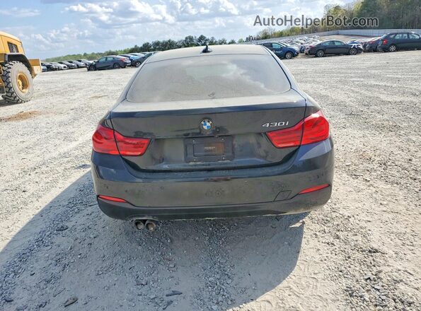 WBA4J1C58KBM12960 2019 BMW 4 SERIES Black წინა სალონის ხედი
