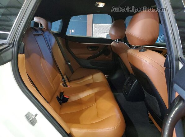 WBA4C9C51GG136141 2016 BMW 4 SERIES White Вид задньої частини салону